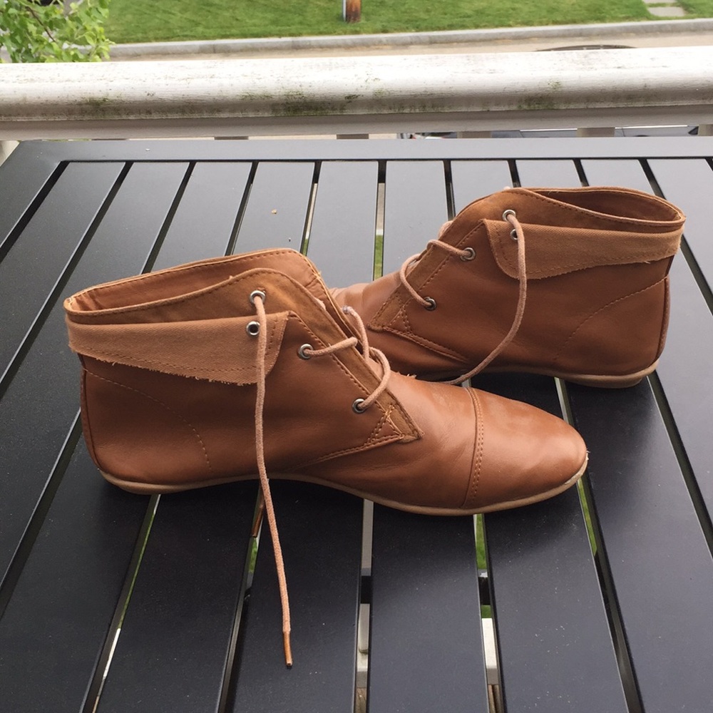 Elf-inspired faux leather shoes